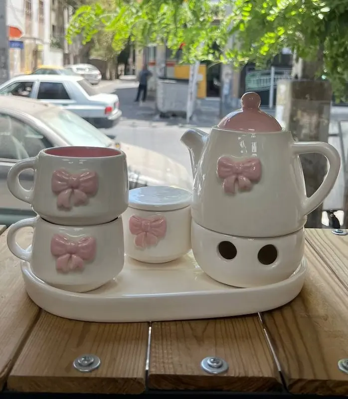 ست چای خوری سرامیکی 2 نفره مدل پاپیونی با قوری و وارمر